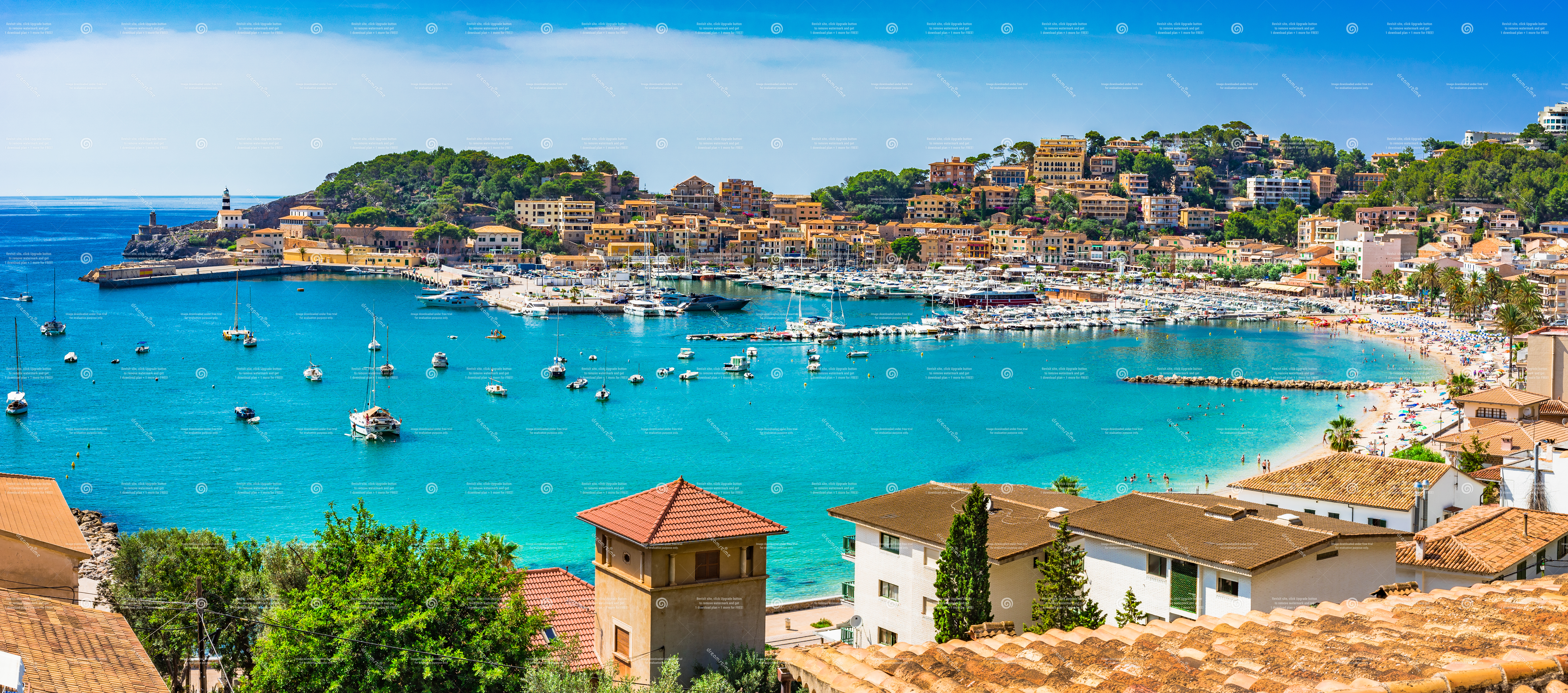 Panoramic view of Balearic port with turquoise water and boats